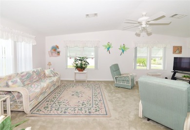 Inviting Triple Wide home on roomy corner double lot. Spacious on Barefoot Bay Golf Course in Florida - for sale on GolfHomes.com, golf home, golf lot