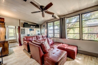 This unique two-bedroom, two-bath home in the gated, golf-course on Lake Fairways Country Club in Florida - for sale on GolfHomes.com, golf home, golf lot