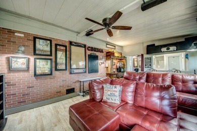This unique two-bedroom, two-bath home in the gated, golf-course on Lake Fairways Country Club in Florida - for sale on GolfHomes.com, golf home, golf lot