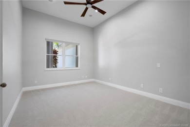 Exceptional custom home, perfectly set within Stuart's on Willoughby Golf Club in Florida - for sale on GolfHomes.com, golf home, golf lot