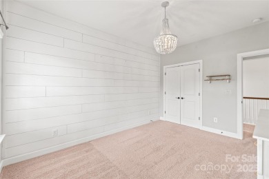 Discover timeless elegance in this full-brick stately Skybrook on Skybrook Golf Club in North Carolina - for sale on GolfHomes.com, golf home, golf lot