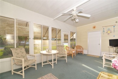 Inviting Triple Wide home on roomy corner double lot. Spacious on Barefoot Bay Golf Course in Florida - for sale on GolfHomes.com, golf home, golf lot