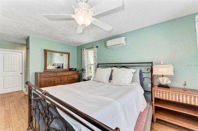 Beautifully updated 3 bedroom, 2 bathroom pool home with dock on on Saint Andrews South Golf Club in Florida - for sale on GolfHomes.com, golf home, golf lot