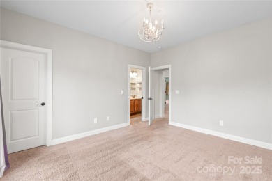 Discover timeless elegance in this full-brick stately Skybrook on Skybrook Golf Club in North Carolina - for sale on GolfHomes.com, golf home, golf lot
