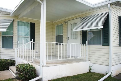 Inviting Triple Wide home on roomy corner double lot. Spacious on Barefoot Bay Golf Course in Florida - for sale on GolfHomes.com, golf home, golf lot