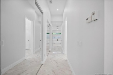 Exceptional custom home, perfectly set within Stuart's on Willoughby Golf Club in Florida - for sale on GolfHomes.com, golf home, golf lot