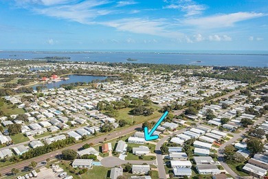 Inviting Triple Wide home on roomy corner double lot. Spacious on Barefoot Bay Golf Course in Florida - for sale on GolfHomes.com, golf home, golf lot