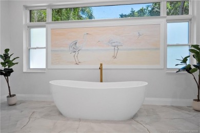 Exceptional custom home, perfectly set within Stuart's on Willoughby Golf Club in Florida - for sale on GolfHomes.com, golf home, golf lot