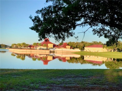 Inviting Triple Wide home on roomy corner double lot. Spacious on Barefoot Bay Golf Course in Florida - for sale on GolfHomes.com, golf home, golf lot