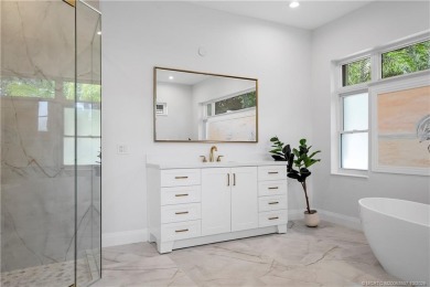 Exceptional custom home, perfectly set within Stuart's on Willoughby Golf Club in Florida - for sale on GolfHomes.com, golf home, golf lot
