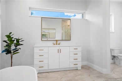Exceptional custom home, perfectly set within Stuart's on Willoughby Golf Club in Florida - for sale on GolfHomes.com, golf home, golf lot
