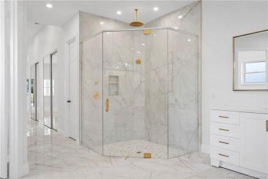 Exceptional custom home, perfectly set within Stuart's on Willoughby Golf Club in Florida - for sale on GolfHomes.com, golf home, golf lot