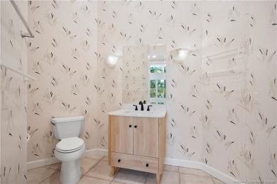 Exceptional custom home, perfectly set within Stuart's on Willoughby Golf Club in Florida - for sale on GolfHomes.com, golf home, golf lot