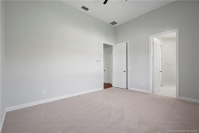 Exceptional custom home, perfectly set within Stuart's on Willoughby Golf Club in Florida - for sale on GolfHomes.com, golf home, golf lot