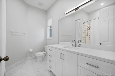 Exceptional custom home, perfectly set within Stuart's on Willoughby Golf Club in Florida - for sale on GolfHomes.com, golf home, golf lot