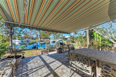 Beautifully updated 3 bedroom, 2 bathroom pool home with dock on on Saint Andrews South Golf Club in Florida - for sale on GolfHomes.com, golf home, golf lot