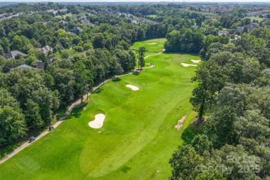 Discover timeless elegance in this full-brick stately Skybrook on Skybrook Golf Club in North Carolina - for sale on GolfHomes.com, golf home, golf lot