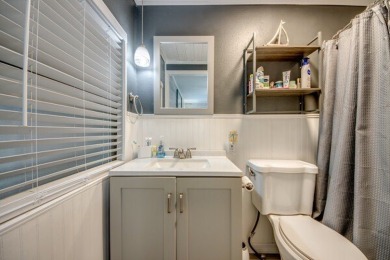 This unique two-bedroom, two-bath home in the gated, golf-course on Lake Fairways Country Club in Florida - for sale on GolfHomes.com, golf home, golf lot