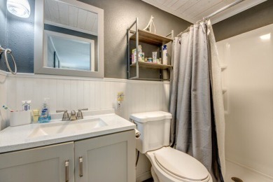 This unique two-bedroom, two-bath home in the gated, golf-course on Lake Fairways Country Club in Florida - for sale on GolfHomes.com, golf home, golf lot