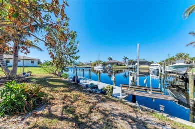 Beautifully updated 3 bedroom, 2 bathroom pool home with dock on on Saint Andrews South Golf Club in Florida - for sale on GolfHomes.com, golf home, golf lot