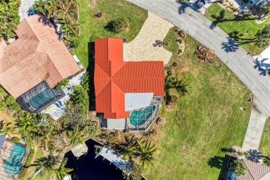 Beautifully updated 3 bedroom, 2 bathroom pool home with dock on on Saint Andrews South Golf Club in Florida - for sale on GolfHomes.com, golf home, golf lot