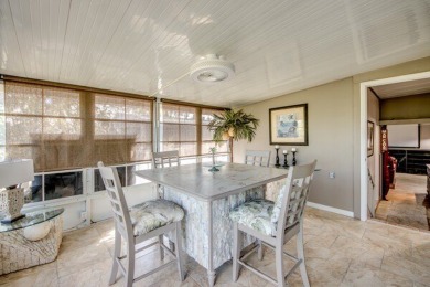 This unique two-bedroom, two-bath home in the gated, golf-course on Lake Fairways Country Club in Florida - for sale on GolfHomes.com, golf home, golf lot