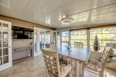 This unique two-bedroom, two-bath home in the gated, golf-course on Lake Fairways Country Club in Florida - for sale on GolfHomes.com, golf home, golf lot