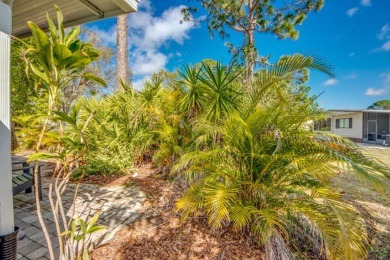 This unique two-bedroom, two-bath home in the gated, golf-course on Lake Fairways Country Club in Florida - for sale on GolfHomes.com, golf home, golf lot