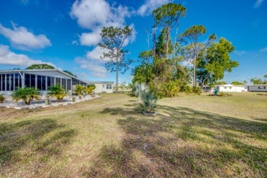 This unique two-bedroom, two-bath home in the gated, golf-course on Lake Fairways Country Club in Florida - for sale on GolfHomes.com, golf home, golf lot