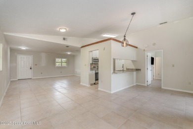 Situated in a sought-after golf course community, the tucked on Rockledge Country Club in Florida - for sale on GolfHomes.com, golf home, golf lot