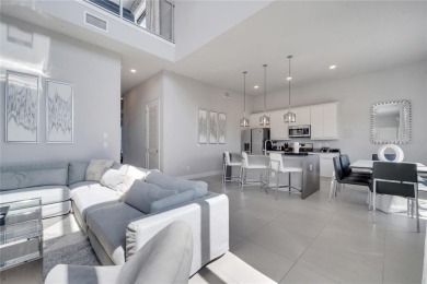 Discover luxury living in this upgraded, fully furnished modern on Reunion Resort Golf Course in Florida - for sale on GolfHomes.com, golf home, golf lot