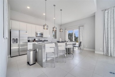 Discover luxury living in this upgraded, fully furnished modern on Reunion Resort Golf Course in Florida - for sale on GolfHomes.com, golf home, golf lot