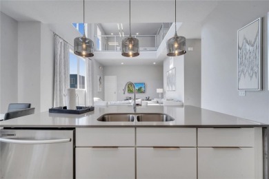 Discover luxury living in this upgraded, fully furnished modern on Reunion Resort Golf Course in Florida - for sale on GolfHomes.com, golf home, golf lot