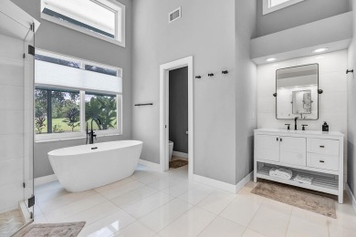Experience luxury living on the 8th hole of the Match Course in on PGA National Golf Club in Florida - for sale on GolfHomes.com, golf home, golf lot