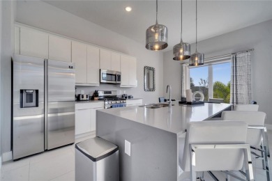 Discover luxury living in this upgraded, fully furnished modern on Reunion Resort Golf Course in Florida - for sale on GolfHomes.com, golf home, golf lot
