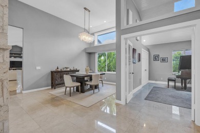Experience luxury living on the 8th hole of the Match Course in on PGA National Golf Club in Florida - for sale on GolfHomes.com, golf home, golf lot