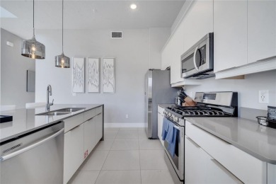 Discover luxury living in this upgraded, fully furnished modern on Reunion Resort Golf Course in Florida - for sale on GolfHomes.com, golf home, golf lot