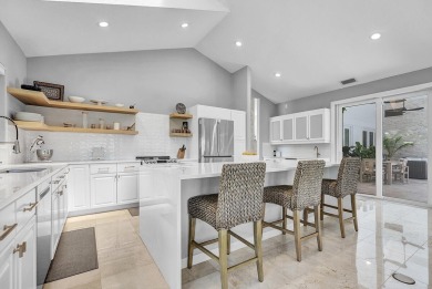 Experience luxury living on the 8th hole of the Match Course in on PGA National Golf Club in Florida - for sale on GolfHomes.com, golf home, golf lot
