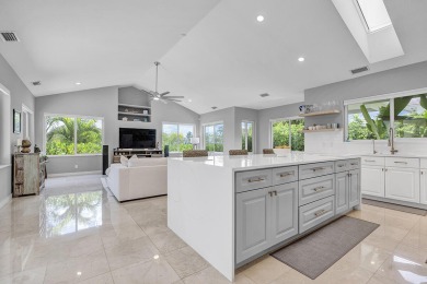 Experience luxury living on the 8th hole of the Match Course in on PGA National Golf Club in Florida - for sale on GolfHomes.com, golf home, golf lot