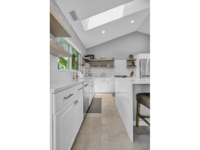 Experience luxury living on the 8th hole of the Match Course in on PGA National Golf Club in Florida - for sale on GolfHomes.com, golf home, golf lot