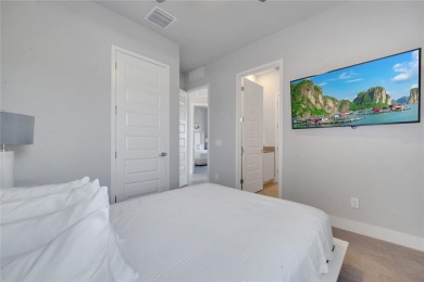 Discover luxury living in this upgraded, fully furnished modern on Reunion Resort Golf Course in Florida - for sale on GolfHomes.com, golf home, golf lot