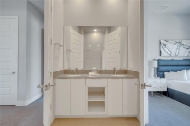 Discover luxury living in this upgraded, fully furnished modern on Reunion Resort Golf Course in Florida - for sale on GolfHomes.com, golf home, golf lot