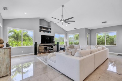 Experience luxury living on the 8th hole of the Match Course in on PGA National Golf Club in Florida - for sale on GolfHomes.com, golf home, golf lot