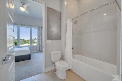Discover luxury living in this upgraded, fully furnished modern on Reunion Resort Golf Course in Florida - for sale on GolfHomes.com, golf home, golf lot