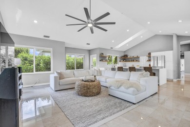Experience luxury living on the 8th hole of the Match Course in on PGA National Golf Club in Florida - for sale on GolfHomes.com, golf home, golf lot