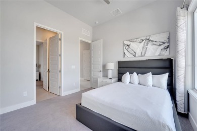 Discover luxury living in this upgraded, fully furnished modern on Reunion Resort Golf Course in Florida - for sale on GolfHomes.com, golf home, golf lot