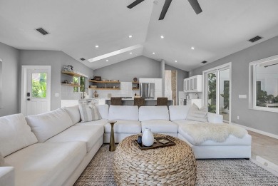 Experience luxury living on the 8th hole of the Match Course in on PGA National Golf Club in Florida - for sale on GolfHomes.com, golf home, golf lot