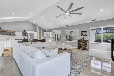 Experience luxury living on the 8th hole of the Match Course in on PGA National Golf Club in Florida - for sale on GolfHomes.com, golf home, golf lot