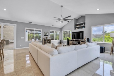 Experience luxury living on the 8th hole of the Match Course in on PGA National Golf Club in Florida - for sale on GolfHomes.com, golf home, golf lot