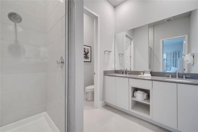 Discover luxury living in this upgraded, fully furnished modern on Reunion Resort Golf Course in Florida - for sale on GolfHomes.com, golf home, golf lot
